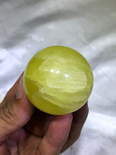 Load image into Gallery viewer, Himalayan Yellow Calcite Sphere

